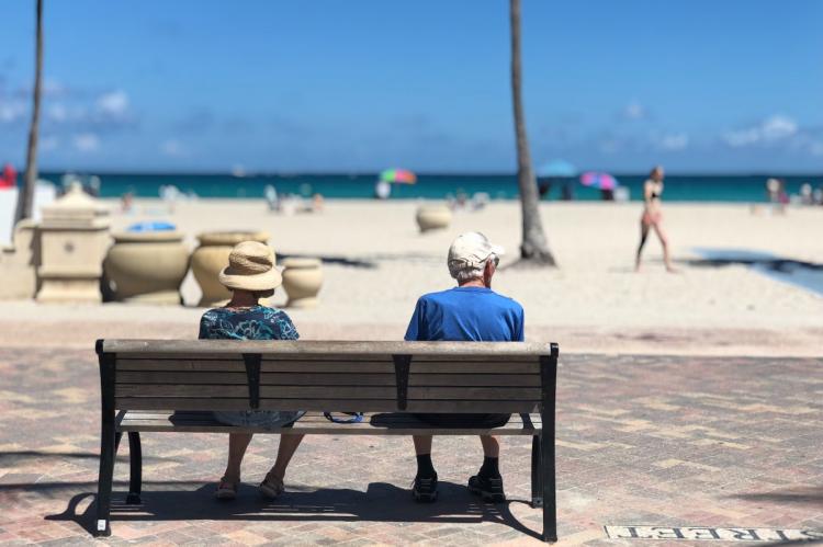 adult beach bench couple depth of field focus leisure miami